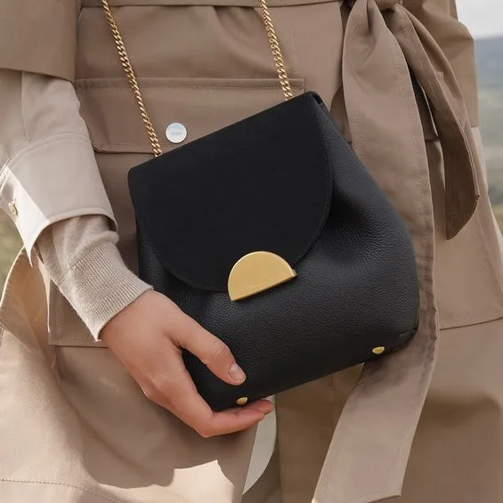 Polene Belt Bag worn by Camille (Camille Razat) as seen in Emily in Paris  (S01E04)