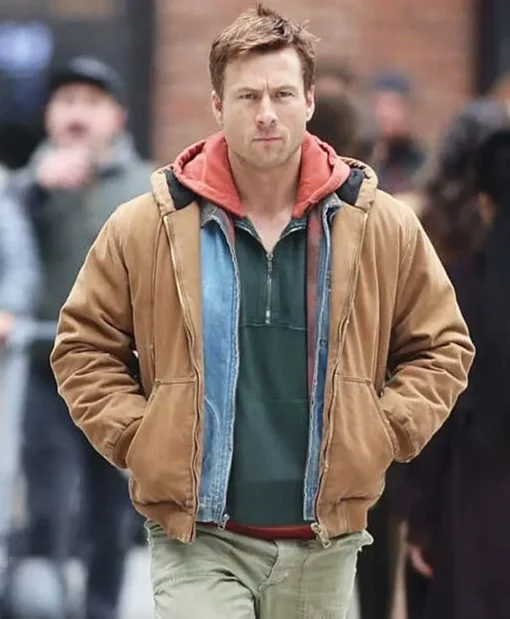 The Running Man Glen Powell Brown Jacket Main