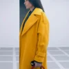 The Substance 2024 Demi Moore Yellow Coat Side