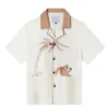 Shop Lalisa Manobal The White Lotus S03 White Monkey Print Shirt